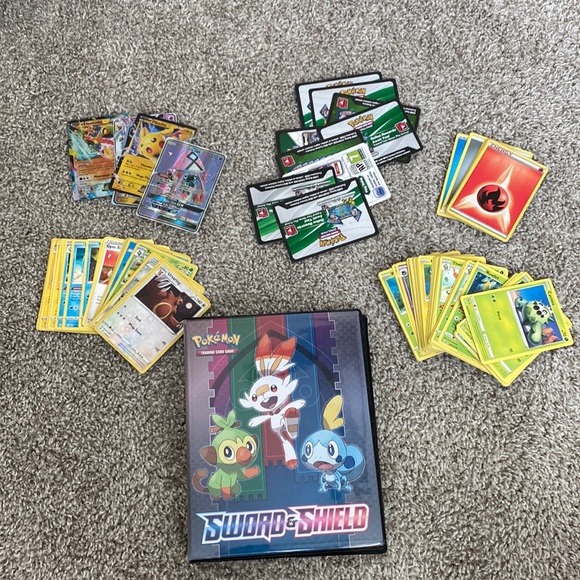 Big lot of Pokemon trading cards with binder